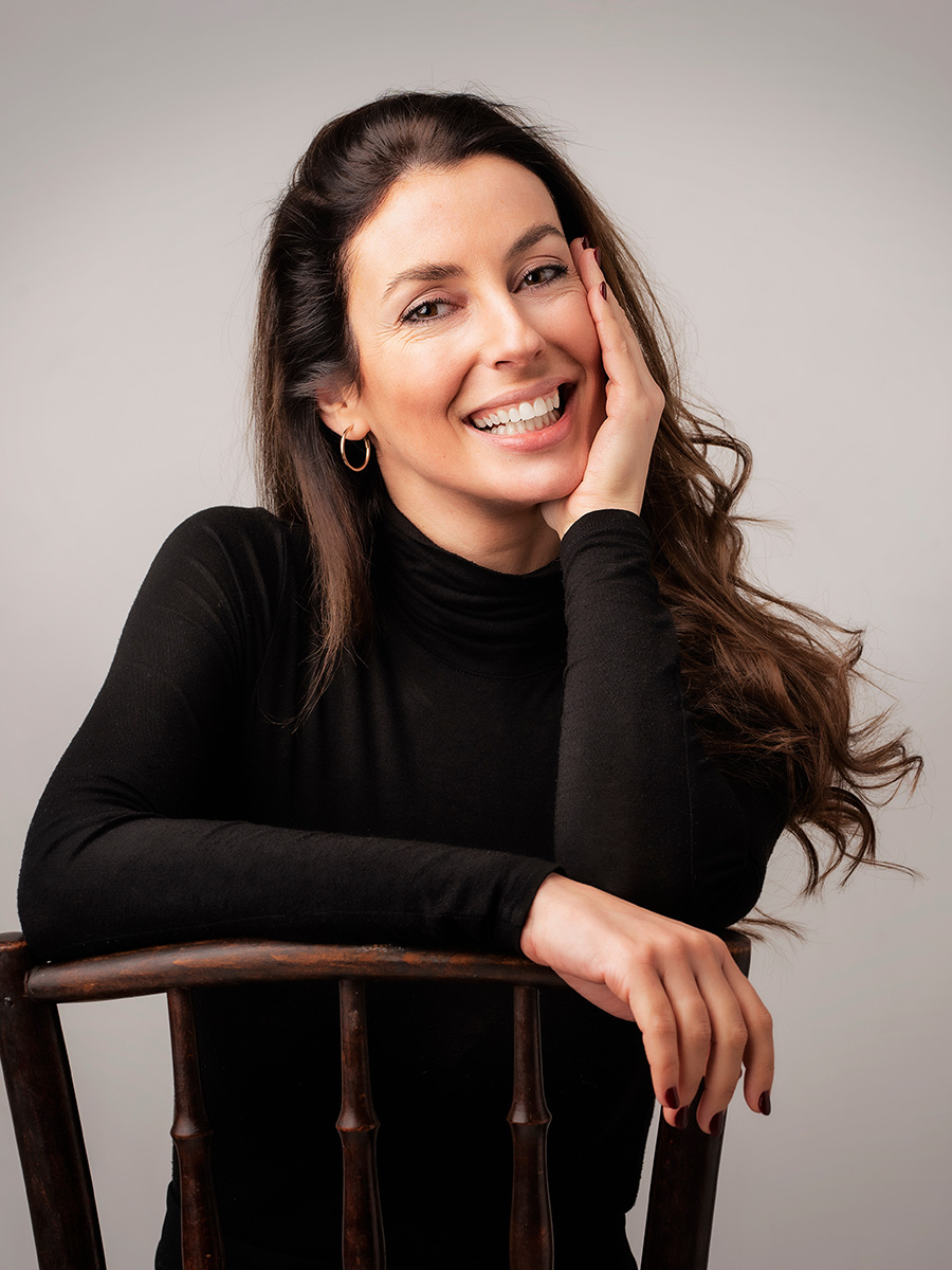 Mature woman sitting on a chair